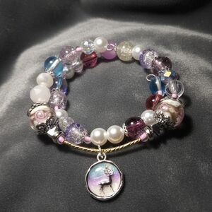 Elegant Multicolor Beaded Bracelet with Deer Charm